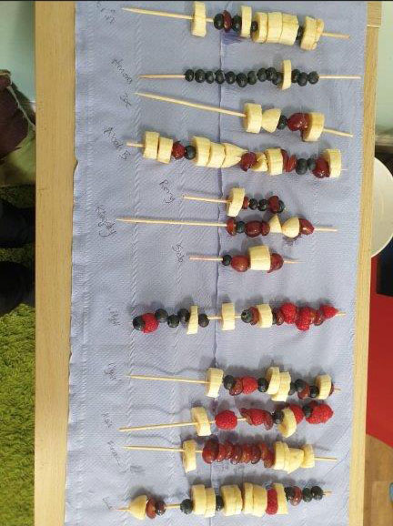 Children taking part in a healthy food activity