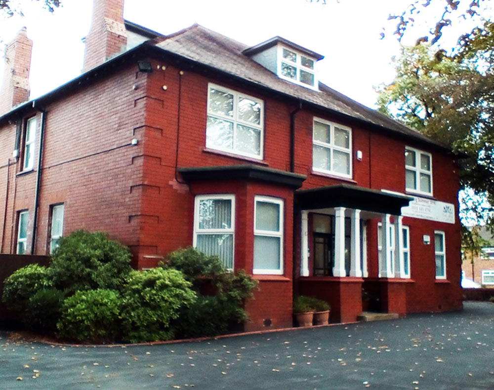 The red-brick nursery building at 77 Alexandra Road South, Whalley Range